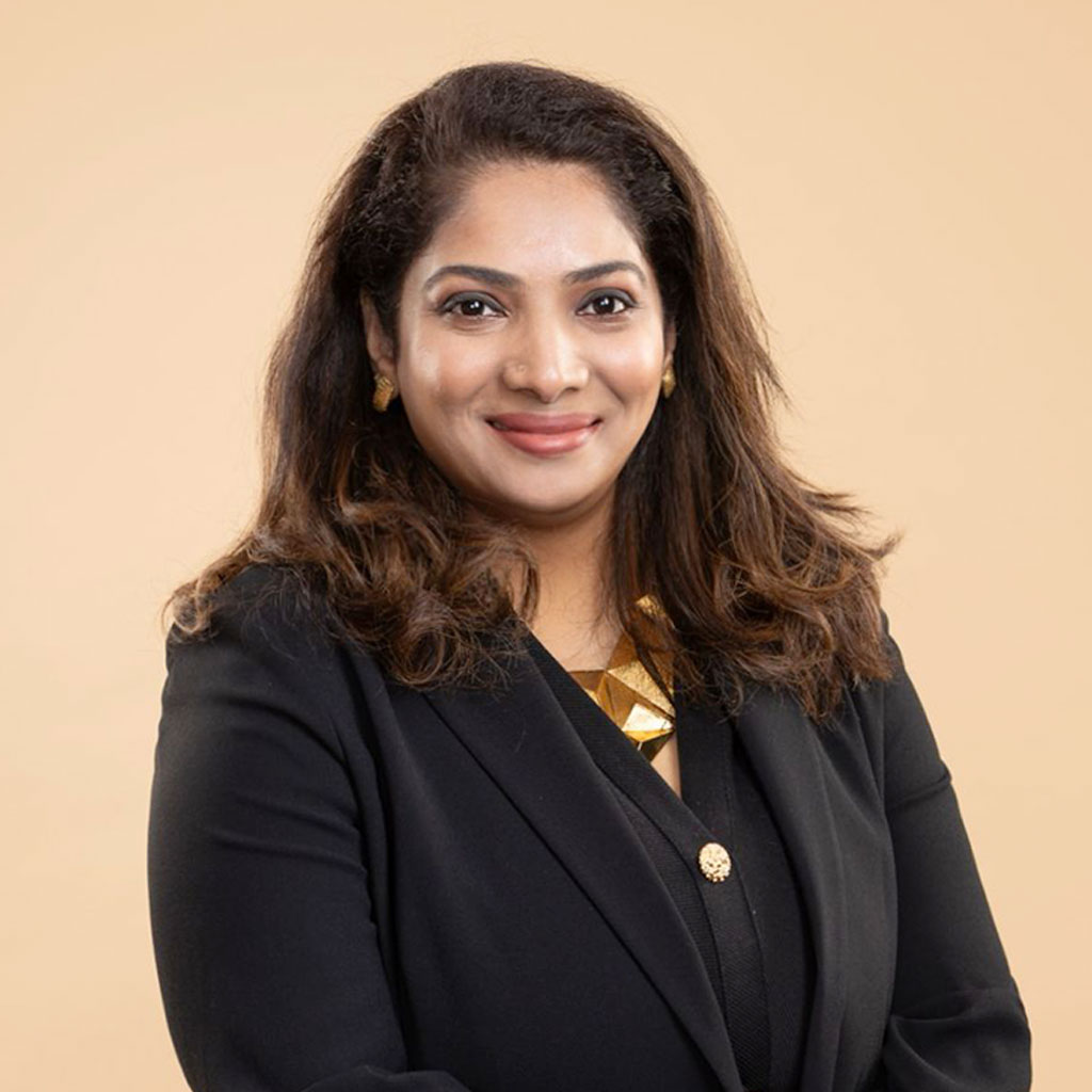 Portrait of Amritha Sankar, a Clinical Dietitian and Certified Diabetes Educator, smiling warmly with a professional background